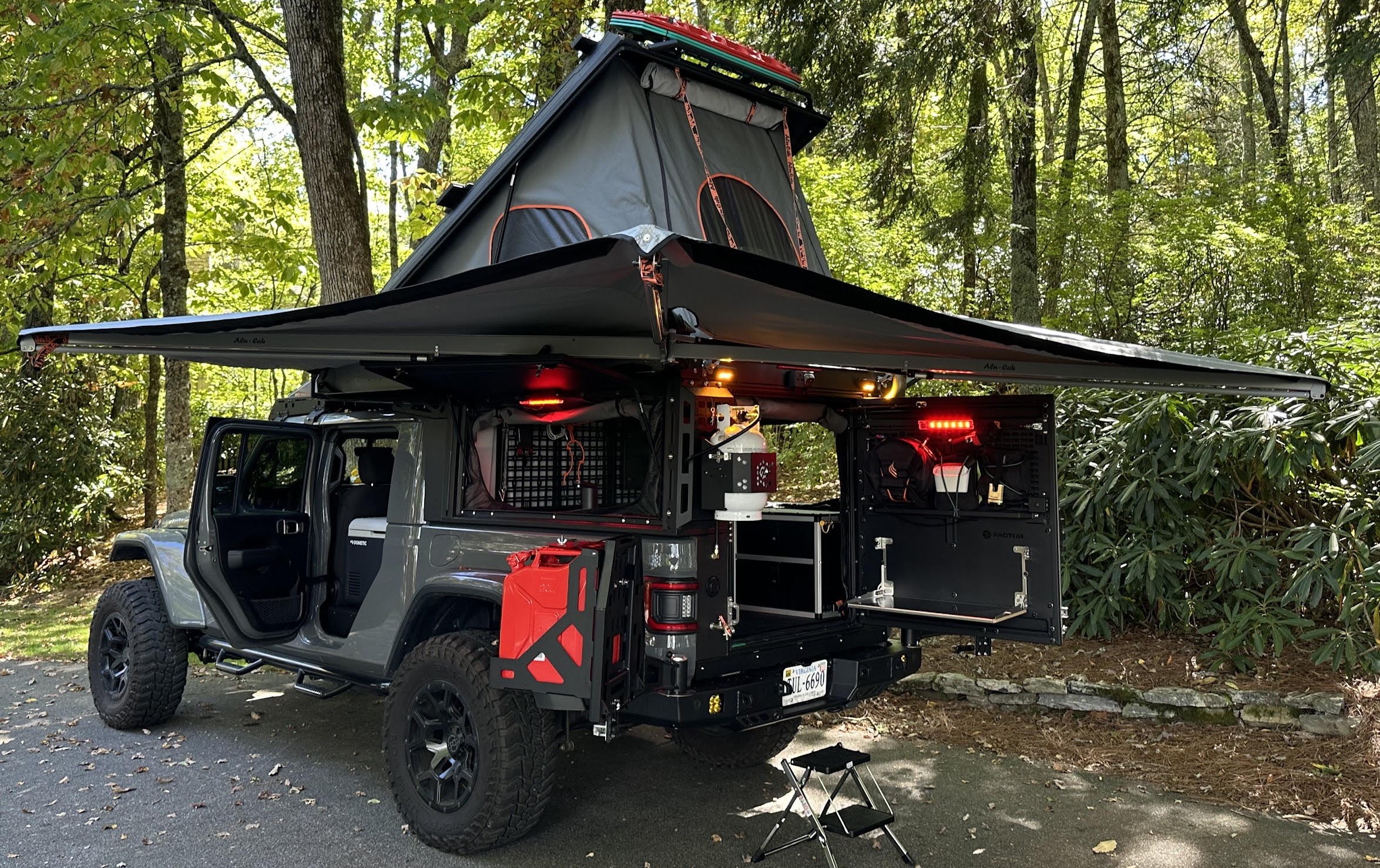 rig with sleeping quarters and canopy shown